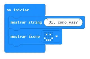 Imagem ilustrativa de uma programação em blocos com diálogo e uma imagem de carinha feliz. 